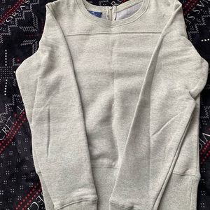 Champion crew neck size S  with cute zipper accent in the back